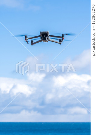 Drone flying on the shore 122862276