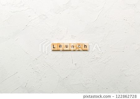 launch word written on wood block. launch text on table, concept 122862728