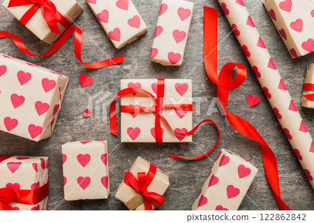 Creative gift box with decorations for the holiday, top view. Birthday and valentine present Creative gift box with decorations for the holiday, top view. Birthday and valentine present 122862842