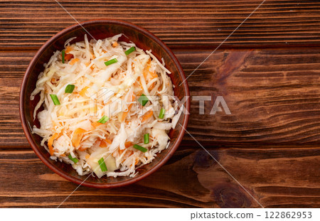Tasty marinated cabbage with carrot, healthy food  Sauerkraut photography . Top view 122862953