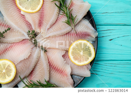 Raw tilapia fillet photography . Top view 122863014