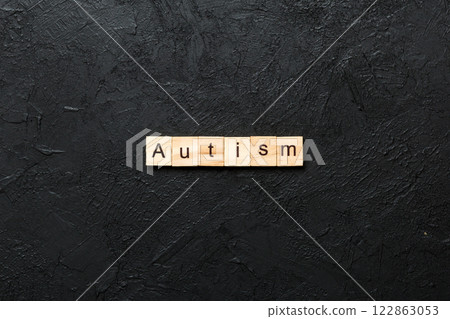 autism word written on wood block. autism text on table, concept 122863053