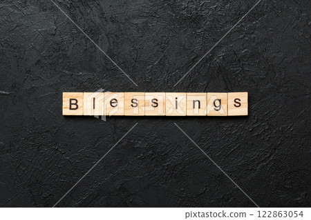 Blessings word written on wood block. Blessings text on cement table for your desing, Top view concept 122863054