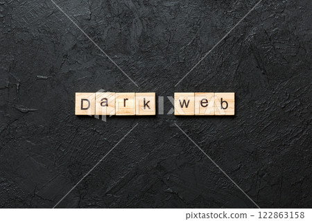 Dark web word written on wood block. Dark web text on cement table for your desing, concept 122863158