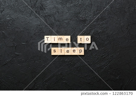 time to sleep word written on wood block. time to sleep text on cement table for your desing, concept 122863170