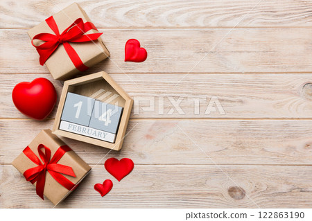 Valentine Day theme with wooden block calendar. Greeting card template for Valentines Day copy space for text Valentine Day theme with wooden block calendar. Greeting card template for Valentines Day copy space for text 122863190