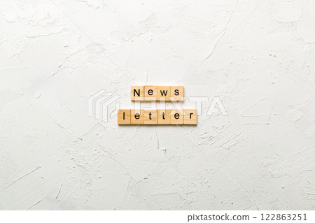newsletter word written on wood block. newsletter text on table, concept newsletter word written on wood block. newsletter text on table, concept 122863251