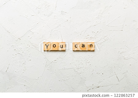 You can word written on wood block. You can text on cement table for your desing, Top view concept 122863257