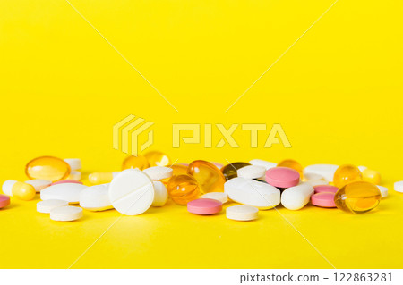 Many different colorful medication and pills perspective view. Set of many pills on colored background 122863281