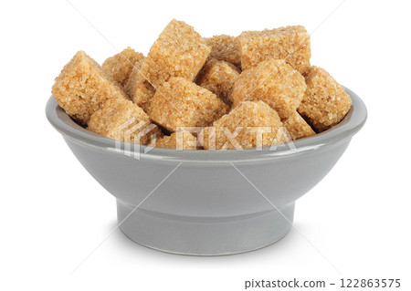 brown sugar in a ceramic bowl isolated on white background brown sugar in a ceramic bowl isolated on white background 122863575