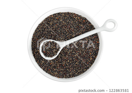 black quinoa in ceramic bowl isolated on white background. Top view. Flat lay 122863581