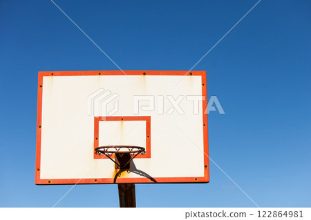 basketball basket against blue sky 122864981