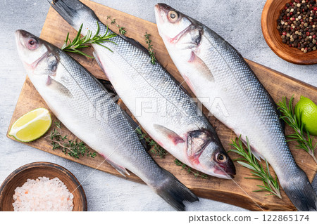 Raw sea bass fish photography . Top view 122865174