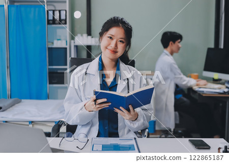 Implement those changes and we can see. Shot of a group of nurses and doctors having a meeting together. 122865187