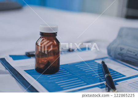 stethoscope on a report stethoscope on a clipboard stethoscope on a book stethoscope on a report stethoscope on a clipboard stethoscope on a book 122865225