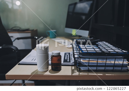 stethoscope on a report stethoscope on a clipboard stethoscope on a book 122865227