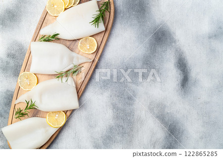 Squid tube and ring photography . Seafood top view 122865285