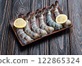 Raw big tiger ( king ) shrimps Cleaned, Peeled & Deveined photography . Top view 122865324