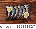 Raw big tiger ( king ) shrimps Cleaned, Peeled & Deveined photography . Top view 122865327