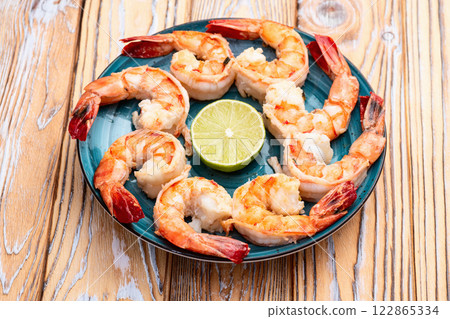 Grilled Tiger shrimps with lime photography . Top view 122865334