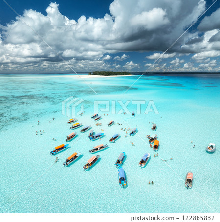 Aerial view of colorful boats and yachts in clear water in summer 122865832