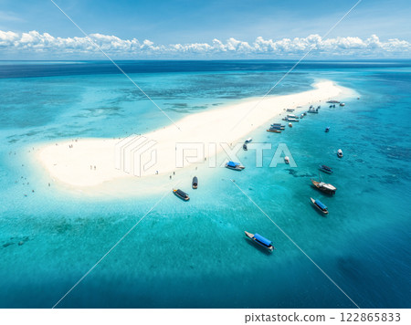 Aerial view of island, sandbank in ocean, white sandy beach, boat Aerial view of island, sandbank in ocean, white sandy beach, boat 122865833