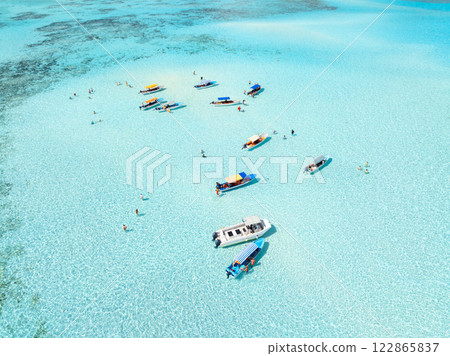 Aerial view of colorful boats, sea with azure water on summer day 122865837