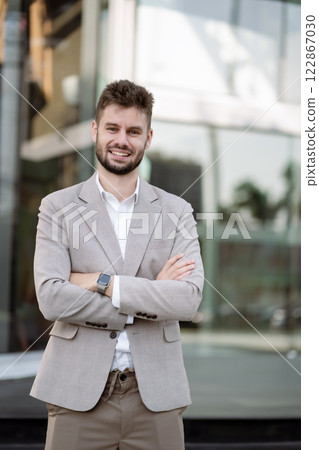 Portrait of a successful business man, confident, looking to camera. 122867030