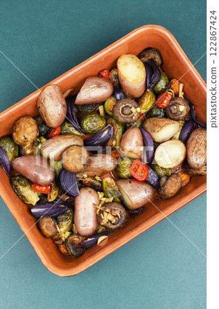 Mixed roasted vegetables on baking tray. 122867424