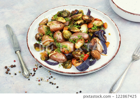 Baked or stewed vegetables. 122867425