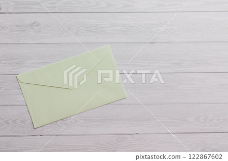 Envelope on the desk Envelope on the desk 122867602