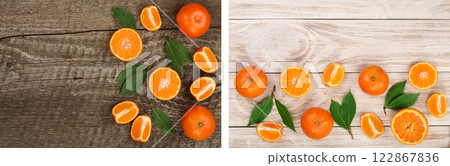 orange or tangerine with leaves on old wooden background. Flat lay, top view. Fruit composition 122867836