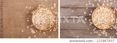 Oat flakes in a wooden bowl on sackcloth with copy space for your text. Top view Oat flakes in a wooden bowl on sackcloth with copy space for your text. Top view 122867837