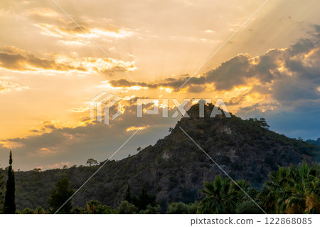 Tropical sunset in the mountains Tropical sunset in the mountains 122868085