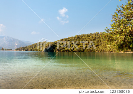 Calm Blue Lagoon on a Clear Summer Day - A Tropical Paradise for Relaxation 122868086