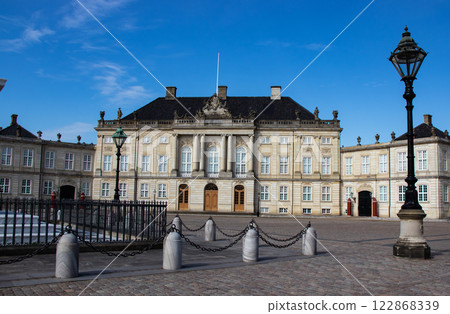Amalienborg, the palace and residence in Copenhagen of the queen of Denmark. Amalienborg, the palace and residence in Copenhagen of the queen of Denmark. 122868339