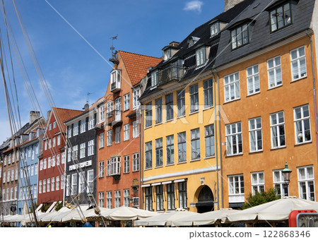 Old Nyhaven port, famous place in Copenhagen, Denmark. Old Nyhaven port, famous place in Copenhagen, Denmark. 122868346