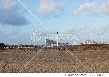 View of Amager Bakke factory with skiing slope on the rooftop in Copenhagen, Denmark. 122868368