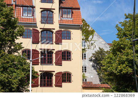 Copenhagen Denmark colorful facades of old houses christianshavn canal 122868369