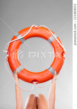 Life buoy ring in female hands 122869052