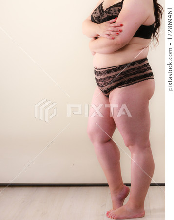 Full body of fat adult woman in lingerie 122869461