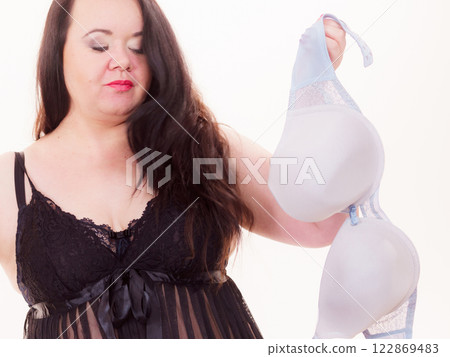 Woman plus size holding bra Woman plus size holding bra 122869483