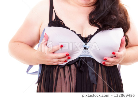 Woman plus size holding bra Woman plus size holding bra 122869486