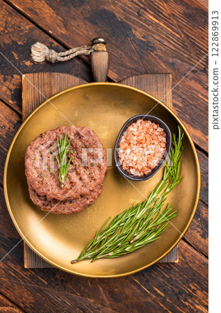 BBQ roasted hamburger chopped meat steaks patties with rosemary. wooden background. top view 122869913