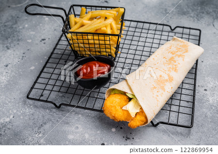 Seafood Doner kebab with shrimps, prawns, salad and french fry. grey background. top view Seafood Doner kebab with shrimps, prawns, salad and french fry. grey background. top view 122869954