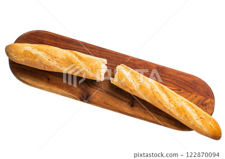French bread baguette on wooden cutting board isolated on white background. top view French bread baguette on wooden cutting board isolated on white background. top view 122870094
