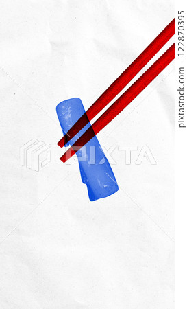 Chopsticks holding blue rice roll against white background. Chopsticks holding blue rice roll against white background. 122870395