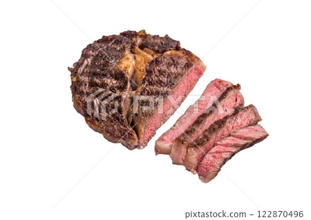 Grilled Rib eye steak with herbs, roast prime beef meat isolated on white background Grilled Rib eye steak with herbs, roast prime beef meat isolated on white background 122870496