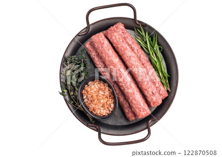 Raw Cevapcici ready for the grill, fresh Cevapi from mince beef meat isolated on white background. top view 122870508