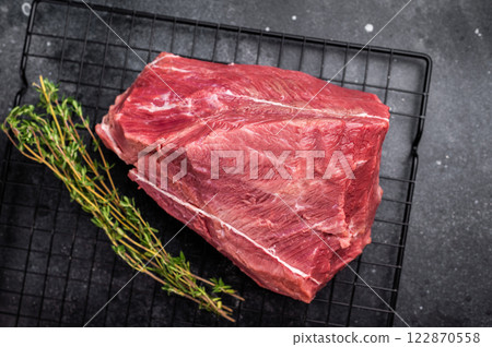 Raw Roe Deer meat, Wild Venison Game Meat. black background. top view 122870558